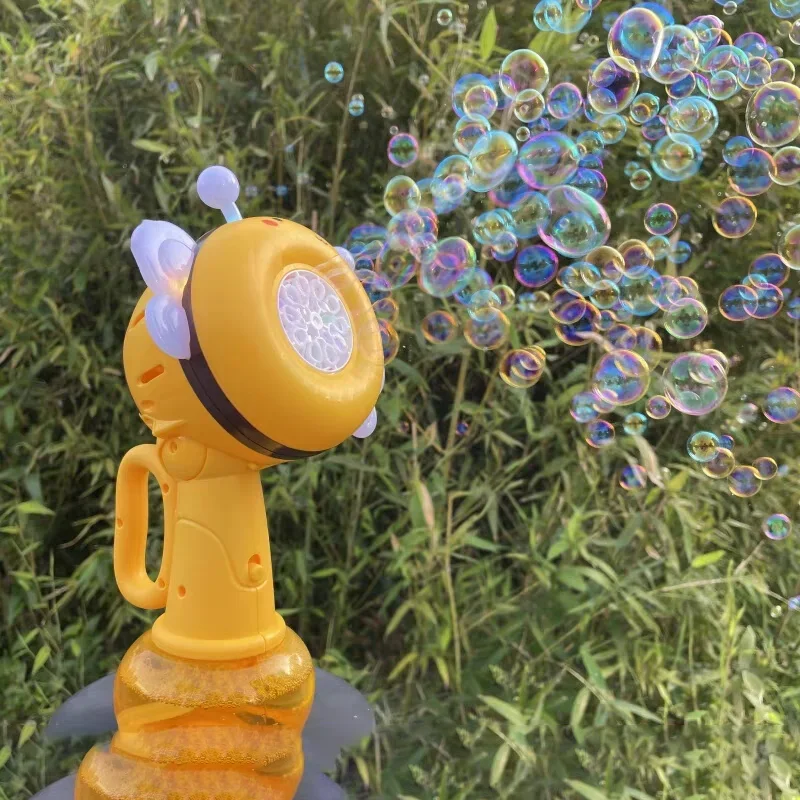 Cartoon Bee Bubble Gun Blower Machine Elektryczna automatyczna dmuchawa do baniek mydlanych Ręczna dmuchawa do baniek mydlanych na jeden klucz Zabawka dla dzieci Prezenty