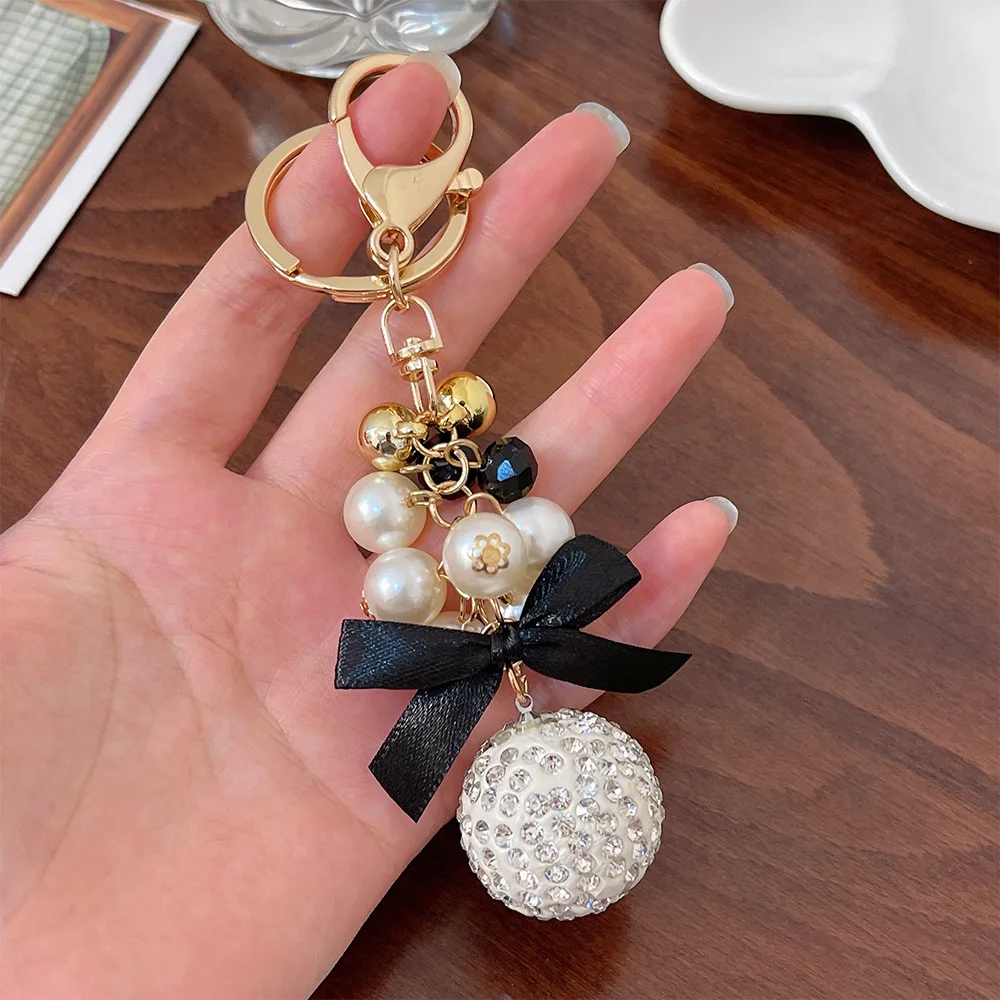 keychain for bags Korean alloy keychain inlaid with rhinestone pearl keychain black bowknot circular ball keychain car keychain