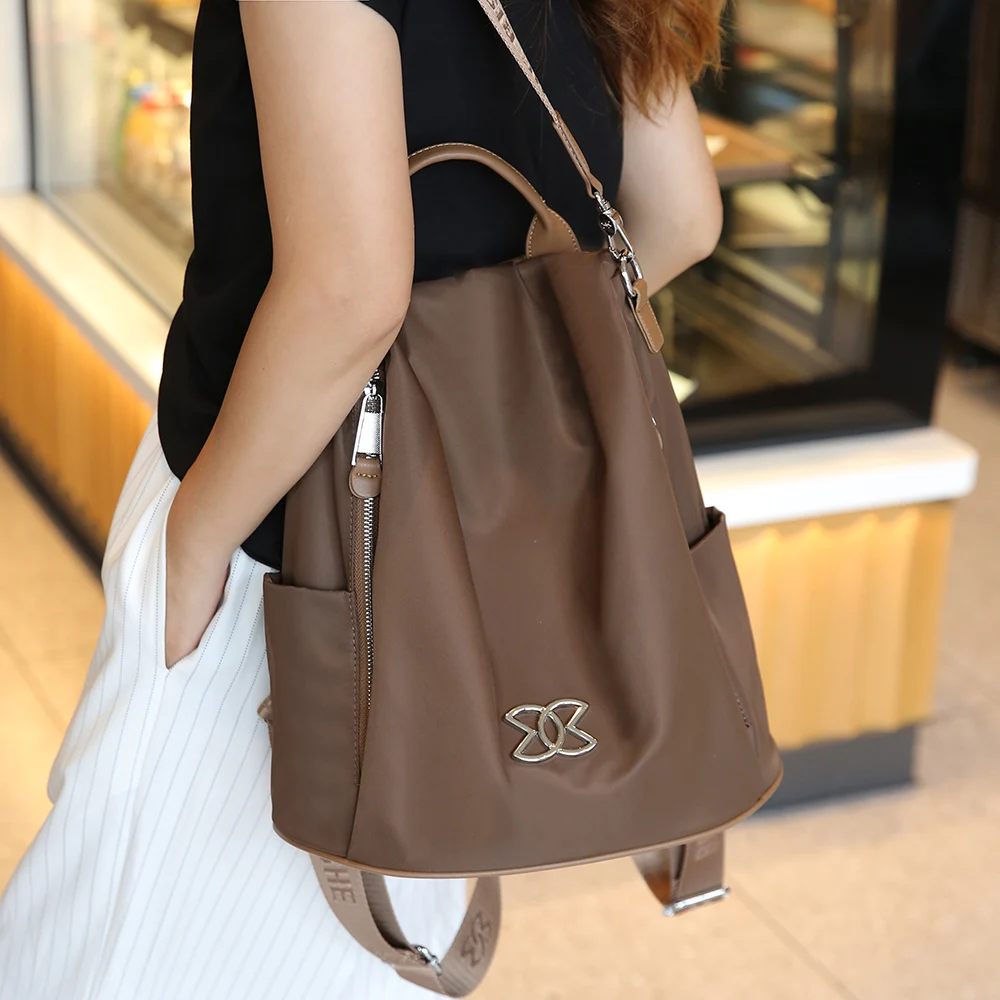 حقيبة ظهر نسائية 2024 جديدة خفيفة الوزن مقاومة للماء بسعة كبيرة متعددة الوظائف كاجوال أسهل لمباراة حقيبة سفر حقيبة ظهر مدرسية #2