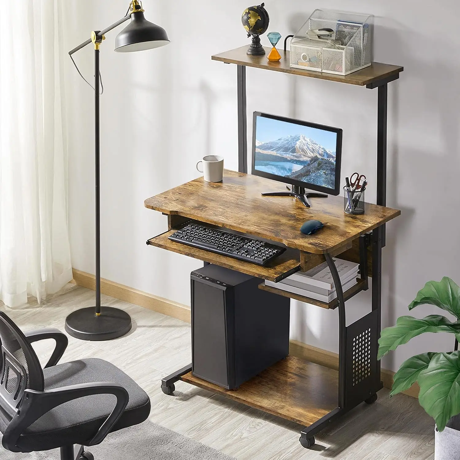 Small Rolling Computer Desk with Hutch and Shelves, Rustic Brown | Particle board and metal, with keyboard tray, hutch, and shelf for a monitor and tower in tight spaces, gliding on casters.