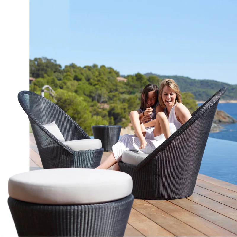 Nordic courtyard high backrest rattan table and chair sofa hotel outdoor leisure rattan chair tea table three-piece combination