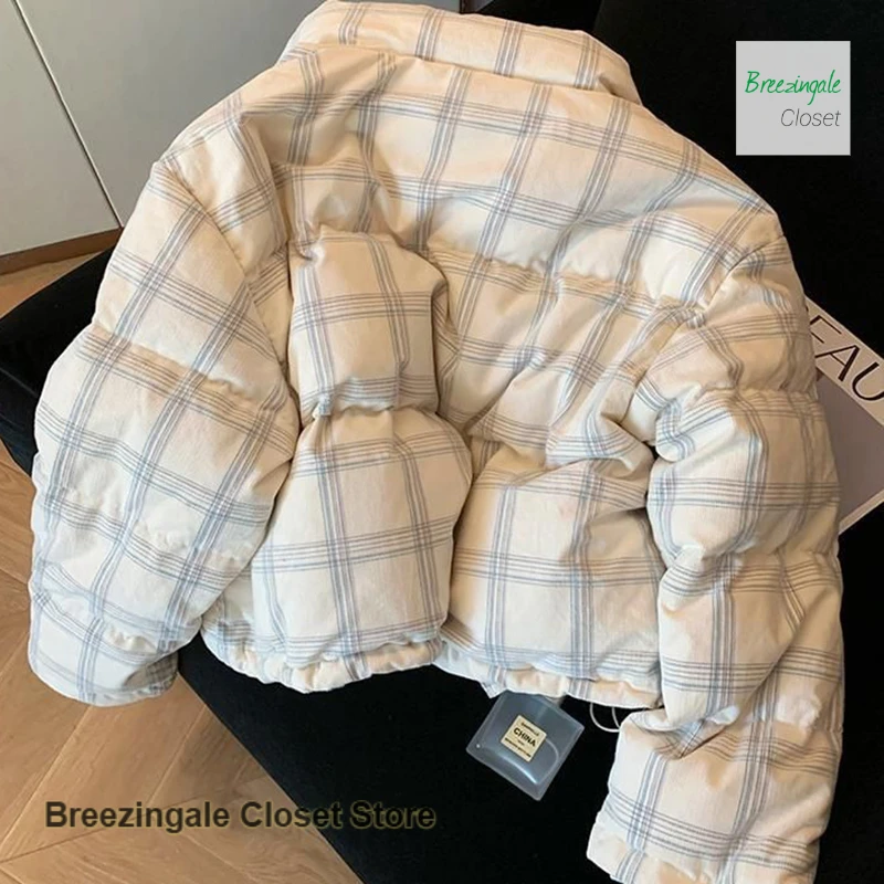 Korean corduroy plaid collar thickened cotton-padded jacket women's autumn and winter new temperament warm casual coat.