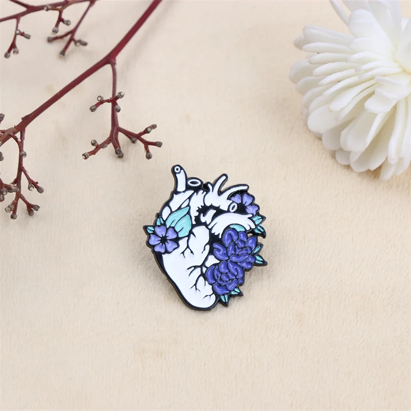 Cool Enamel Brooch Featuring a Heart Embellished with Flowers, Perfect for Adding a Stylish Vibe to Casual Outfits.