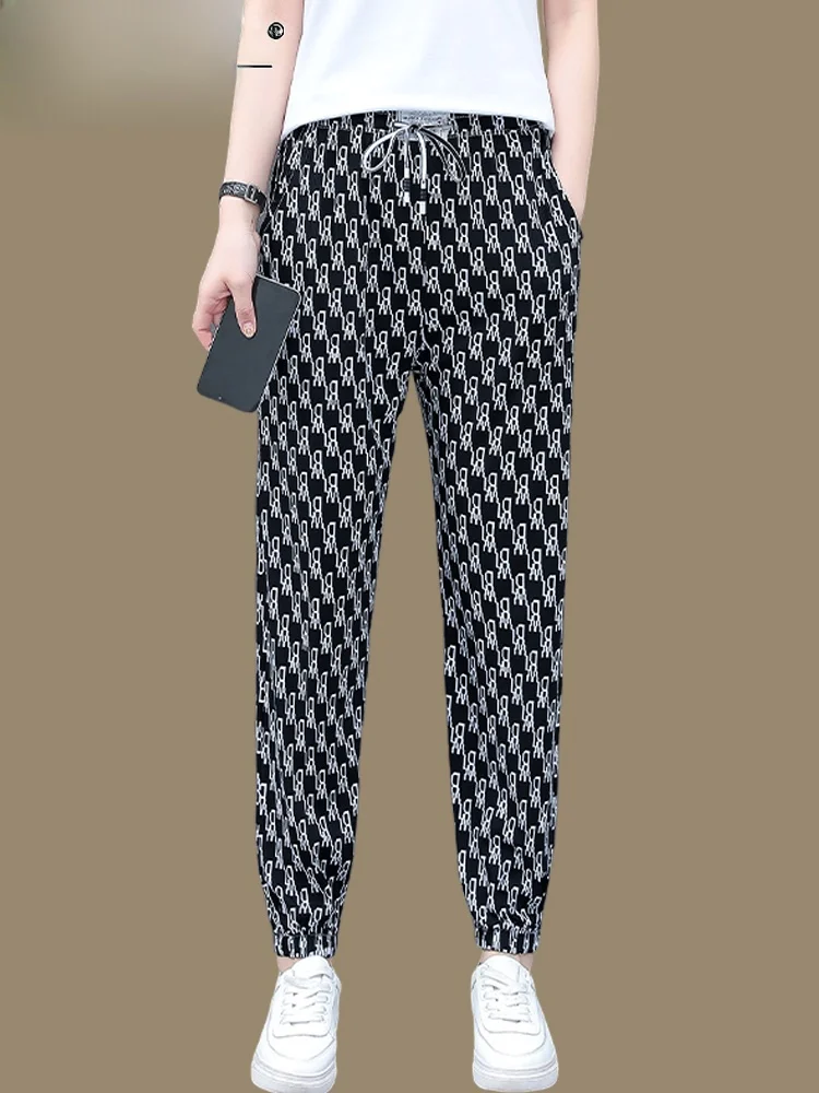 

Qui Dry Ice Silk Loose Women's Sport Pants Thin Harlan Summer Casual Trousers Asymmetric Korean Sle Nine Points Elastic W...