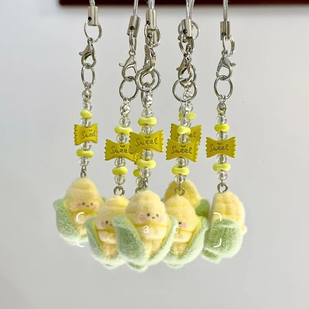 

[Кукуруза супер сладкий] Ручная работа, милая кукурузная цепочка для мобильного телефона «Tian Xuning Ziyu», подвесной кулон для школьной сумки