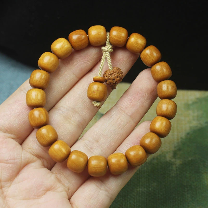 

Sandalwood vintage-style beads 0.9mm bracelet with Vajra pendant, unisex cultural and spiritual prayer beads and Buddhist jewelr