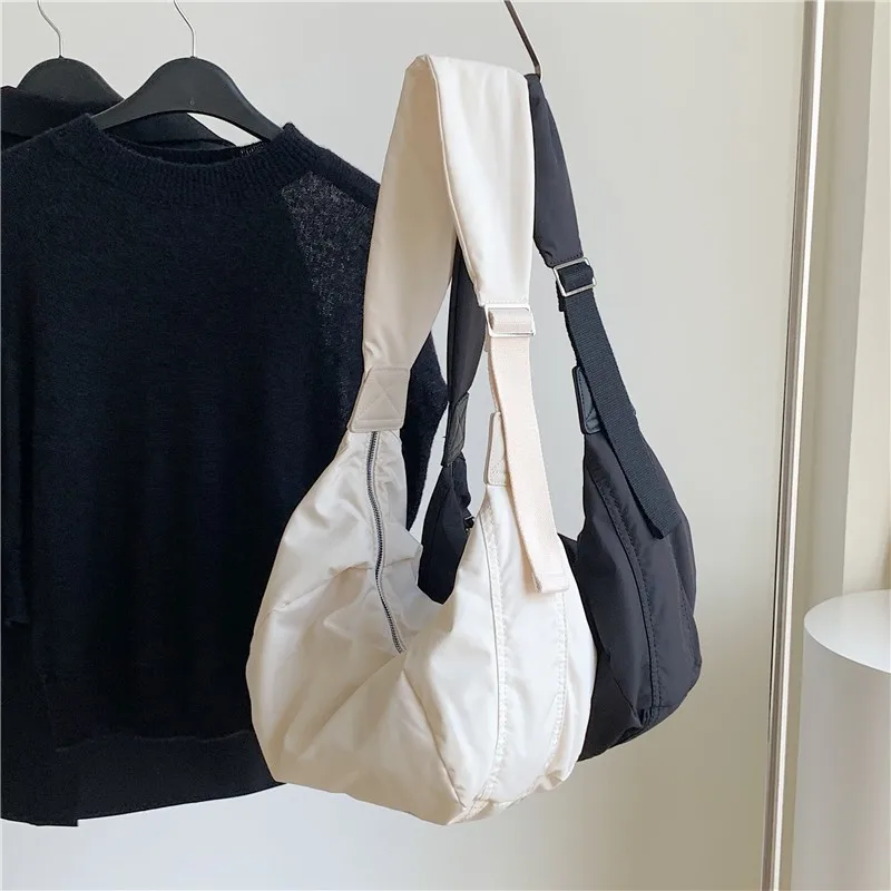 Korean large-capacity wide shoulder strap canvas crossbody bag women's ins niche design pleated dumpling shoulder bag