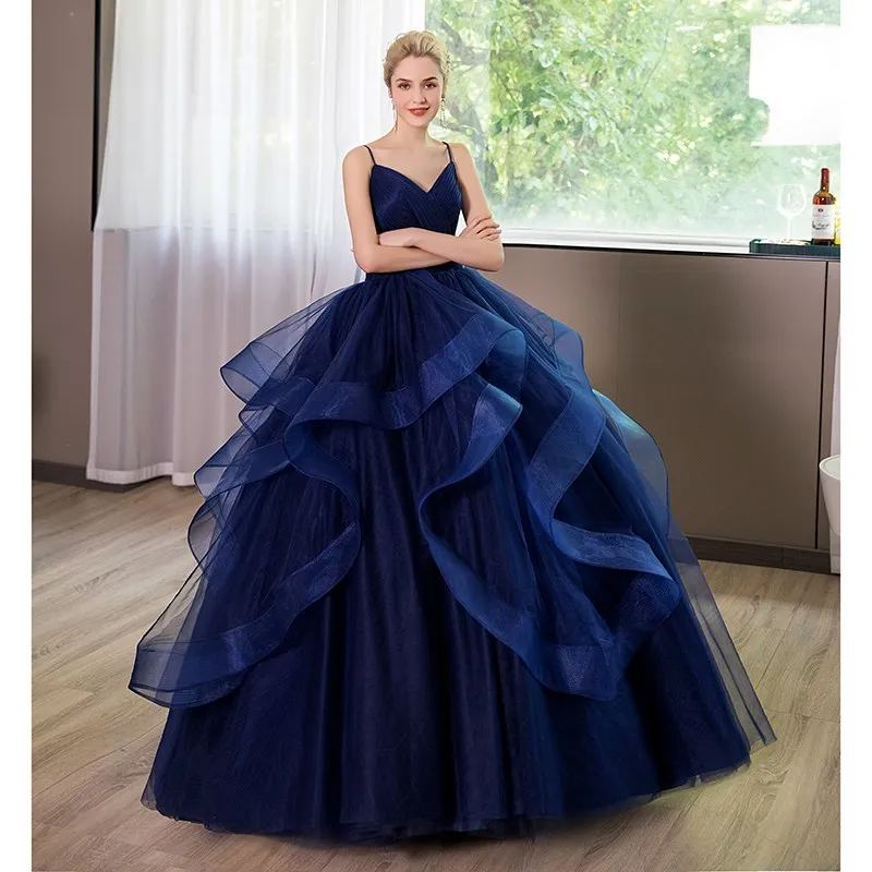   Abiti Quinceanera blu Abiti da ballo di lusso con scollo a V Abito da ballo Elegante cinturino per spaghetti Abiti da 15 Anos Quinceanera personalizzato