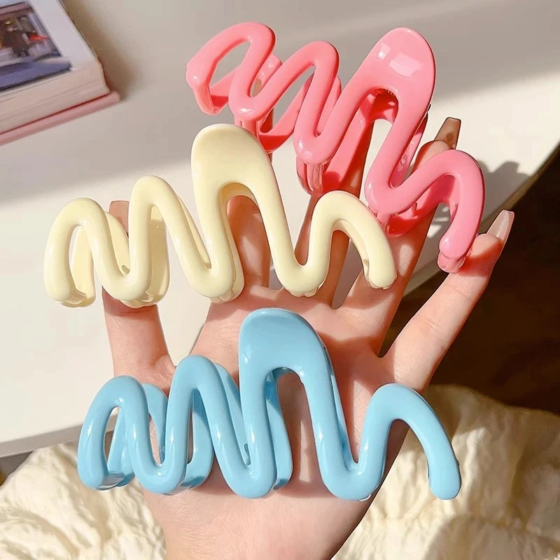 Nuovo colorato Jelly Wave Hair Claw Hairpin Women Girls Fashion Design coreano dolce semplice irregolare fermaglio per capelli copricapo all\'ingrosso