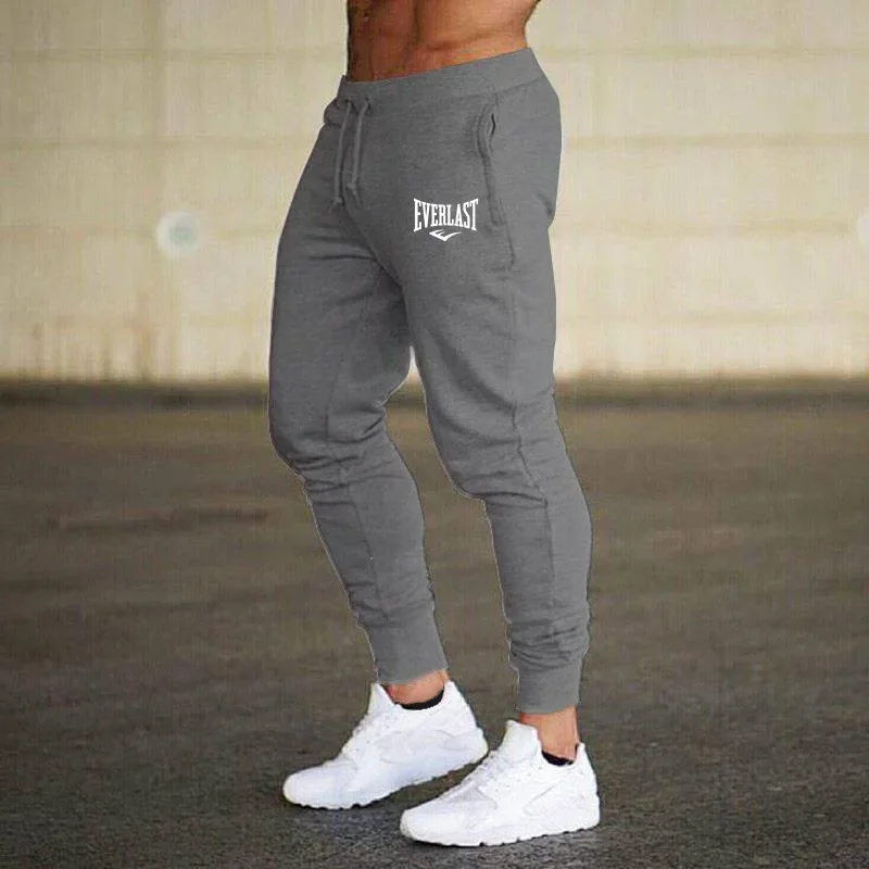 جديد السراويل المطبوعة الخريف EVERLAST الرجال/النساء تشغيل السراويل ركض Sweatpant الرياضة بناطيل كاجوال اللياقة البدنية الصالة الرياضية تنفس السراويل