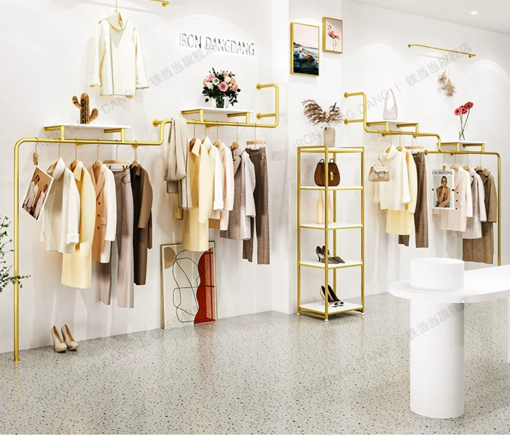 

Women's clothing store shelves display racks wall mounted combination iron gold hanging hangers Clothing store display racks