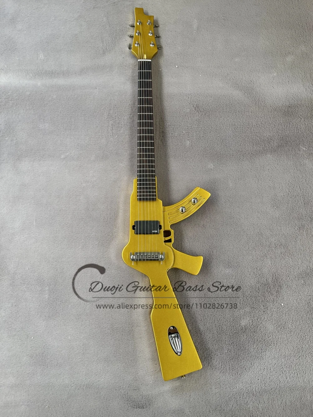 Golden guitar, fixed bridge, imitation AK gun shape, solid wood body with maple neck, chrome hardware, customizable