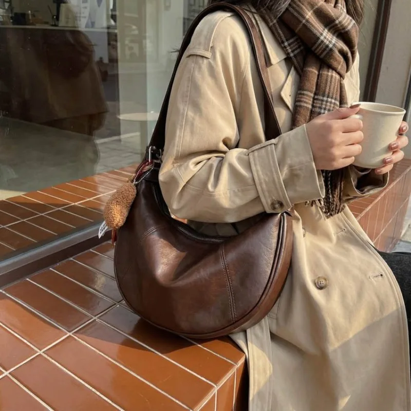 女性のためのファッショナブルなおむつバッグ、ヴィンテージレザーサッチェル、ハイエンドのミニマリストメッセンジャーバッグ、レジャーやビジネスに最適