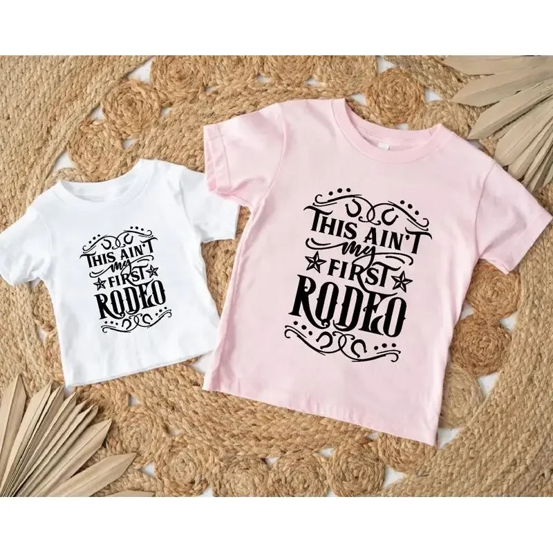 Funny Rodeo T Shirt For Toddler Kids Cowboy Baby Birthday This Ain't My First Country Western