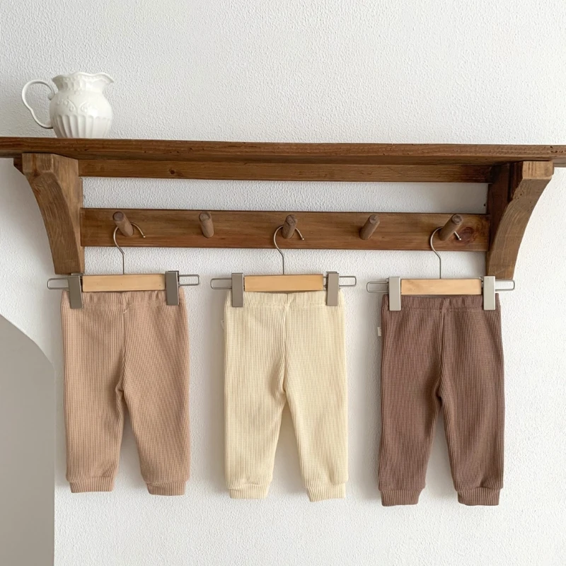 Pantalones de algodón con apliques de oso de dibujos animados para niños y niñas, pantalones de cintura elástica media, pantalones informales
