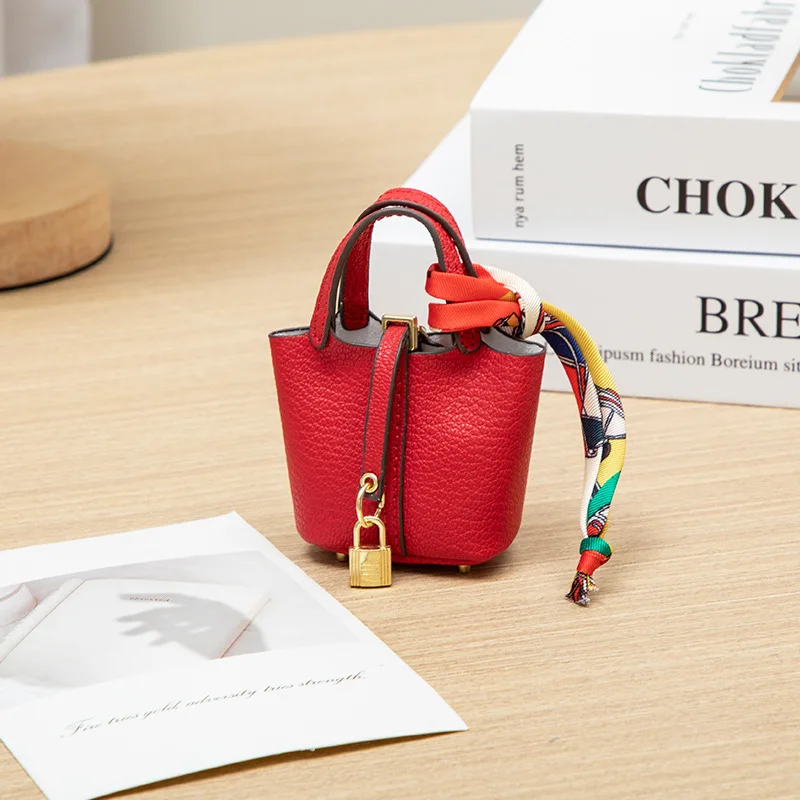 2026 Mini-Taschenanhänger Schlüsselanhänger Hängeaccessoire Zero Wallet Kreatives tragbares Armband Bluetooth-Kopfhörertasche Multifunktional – Detail 10