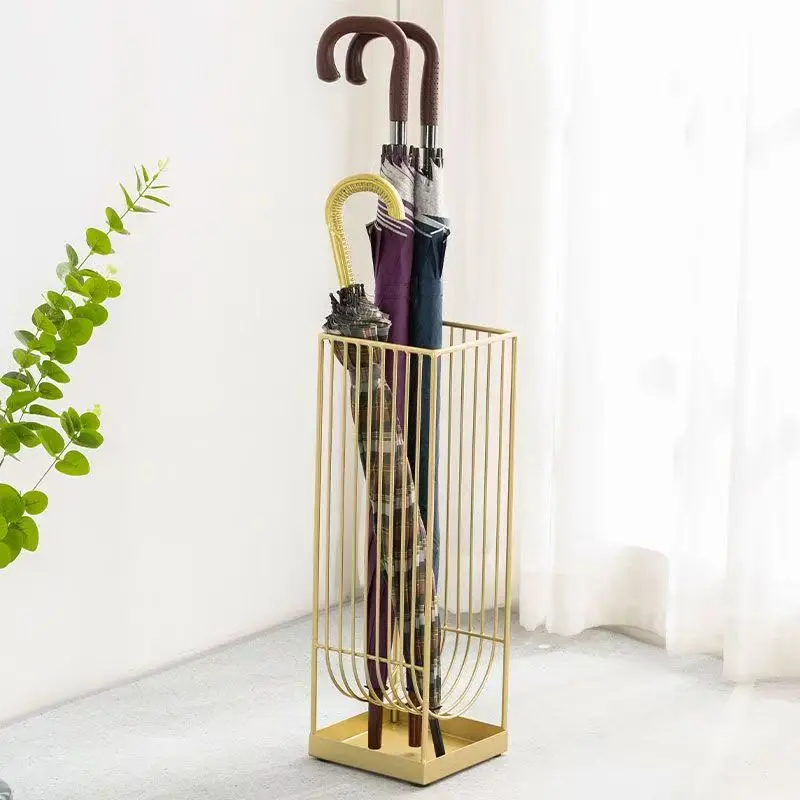 Modern steel portable waterproof umbrella stand with gold finish, designer entrance stand for home office and hotel lobby