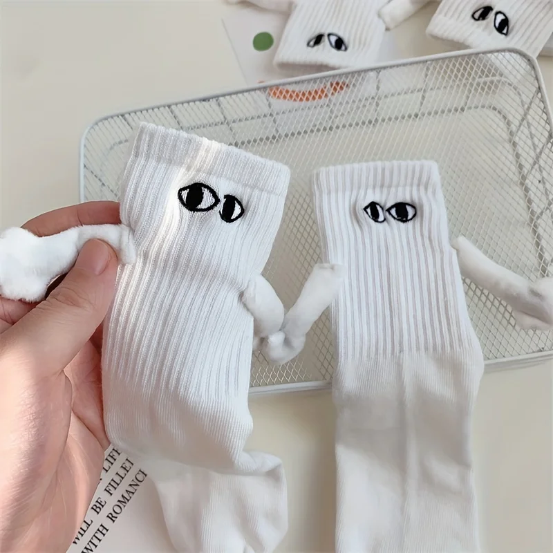 A pair of mid length socks, trendy for both men and women, magnetic attraction, super personality, 3D dolls, black and white ero