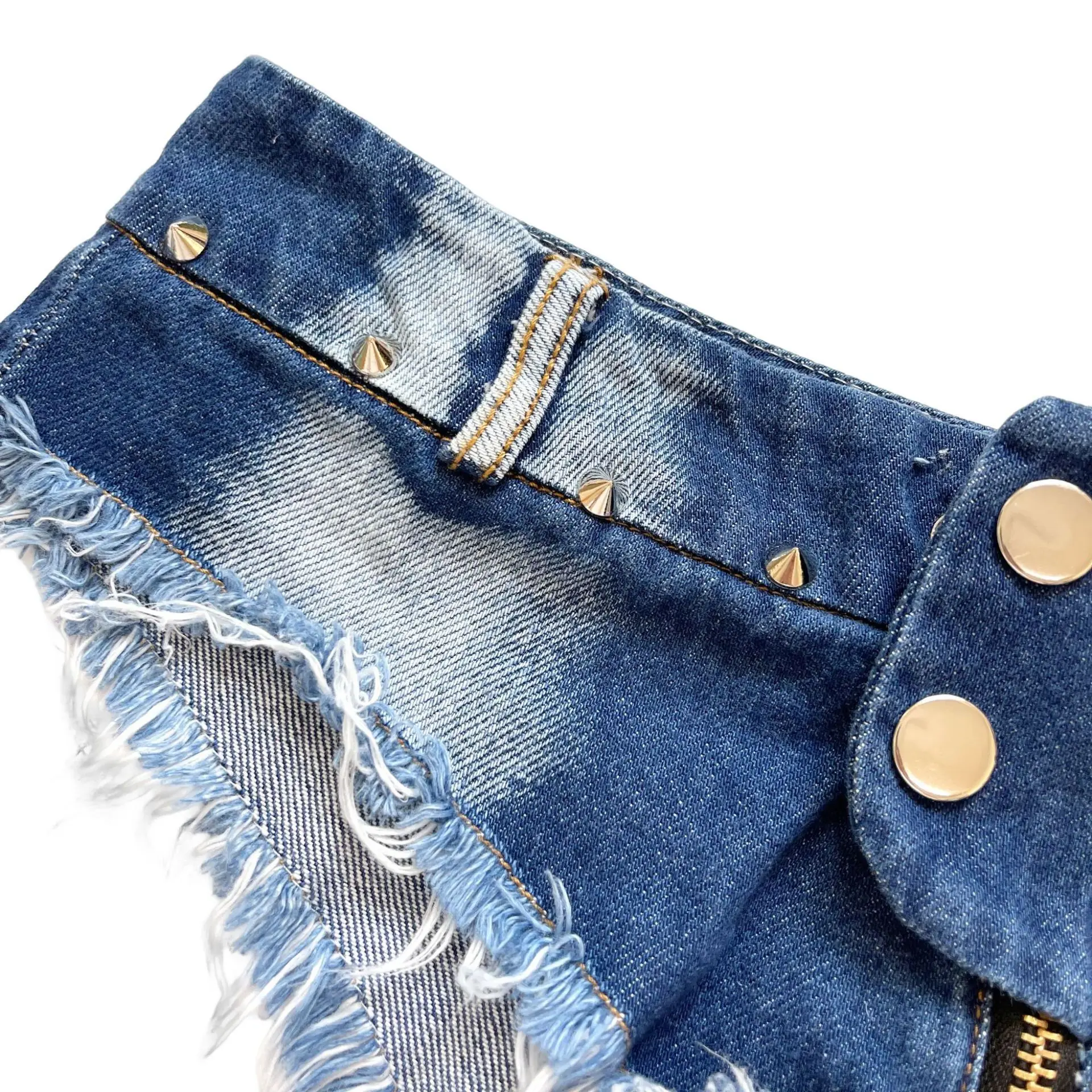 Pantaloni caldi a vita bassa retrò Spice Girl strappati pantaloncini super denim da donna