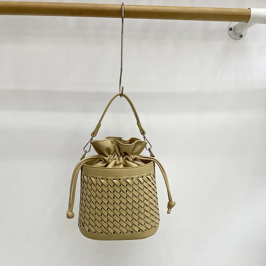 Summer Korea new fashion drawstring bucket bag woven hollow out ladies shoulder crossbody bag female pu leather purse handbags