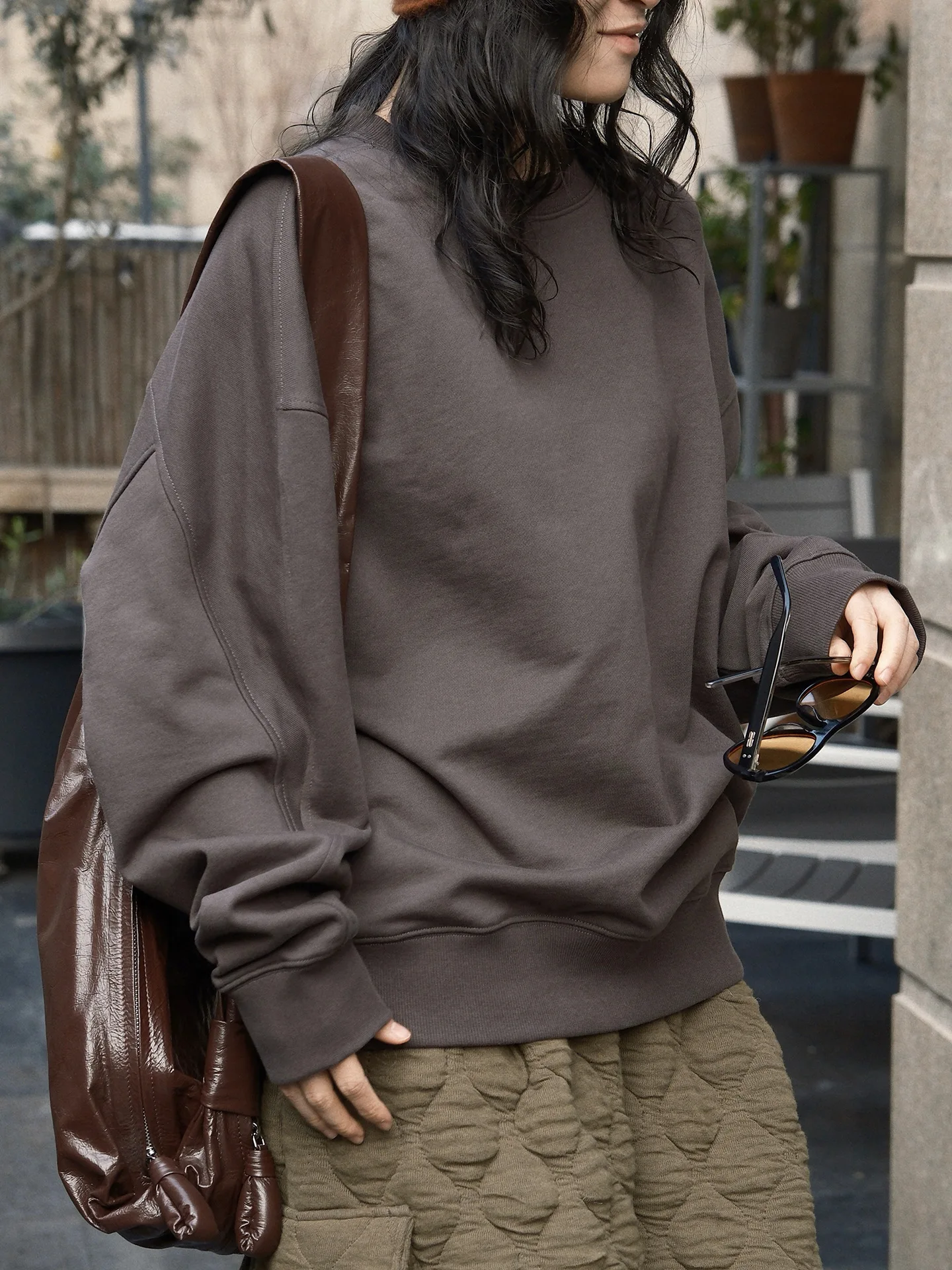 

Spring minimalist casual style round neck solid color pullover hoodie with loose silhouette and comfortable top for women