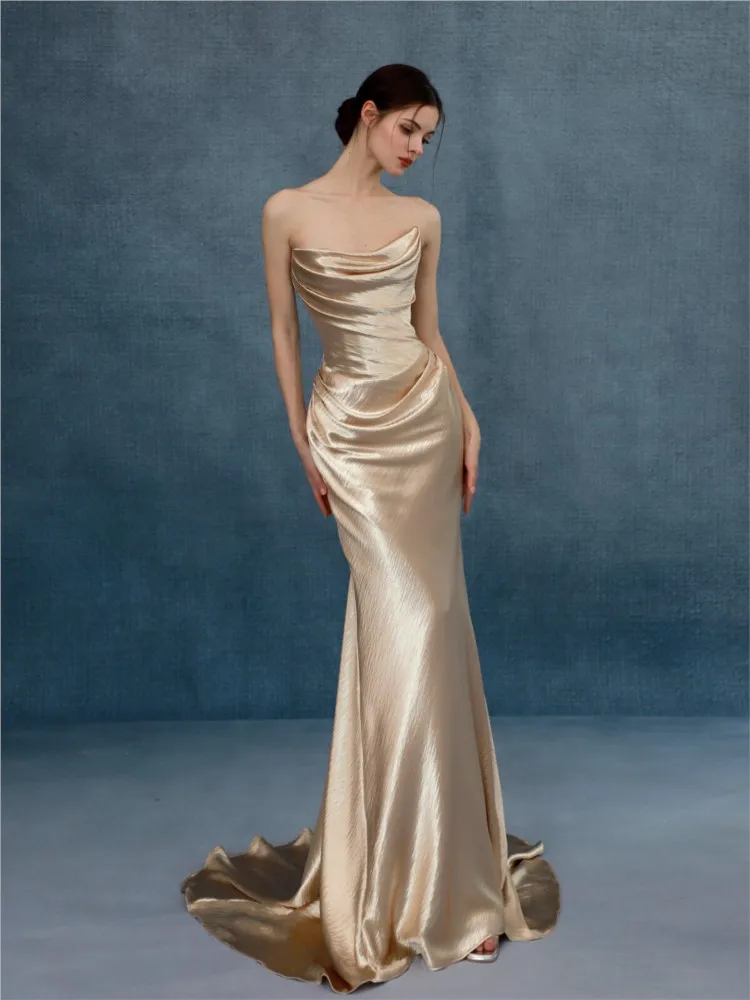Champagne gold fishtail evening gown and toasting skirt