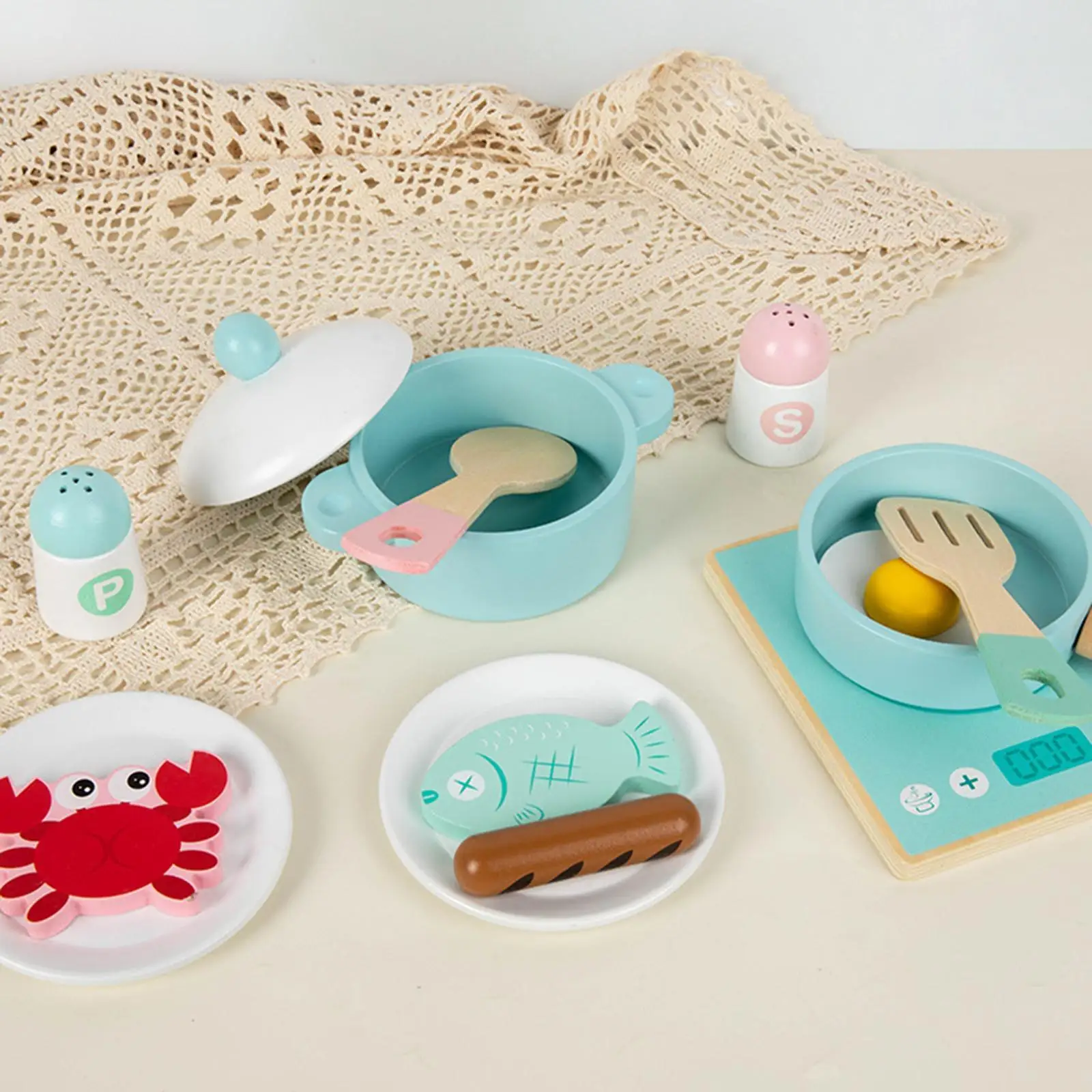 Conjunto de cozinha infantil com ferramentas de cozinha e itens alimentares