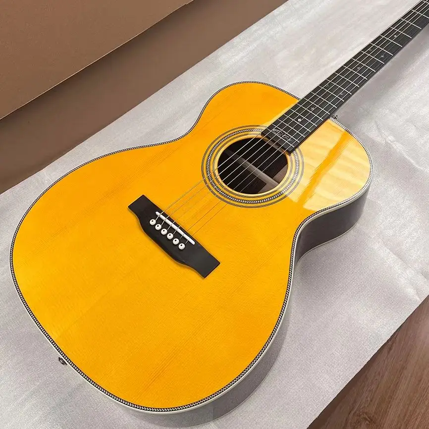 

Solid Spruce Top, Handmade 000 28 style EC Signature Auditorium Acoustic Guitar Yellow Color, Back And Side Are Laminate Rosewo