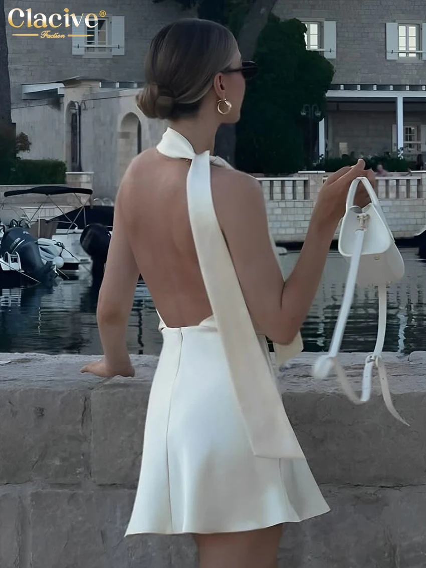 Clacive 여름 슬림 베이지 새틴 여성 드레스 섹시한 홀터넥 민소매 미니 드레스 우아한 레이스 업 높은 허리 백리스 여성 드레스