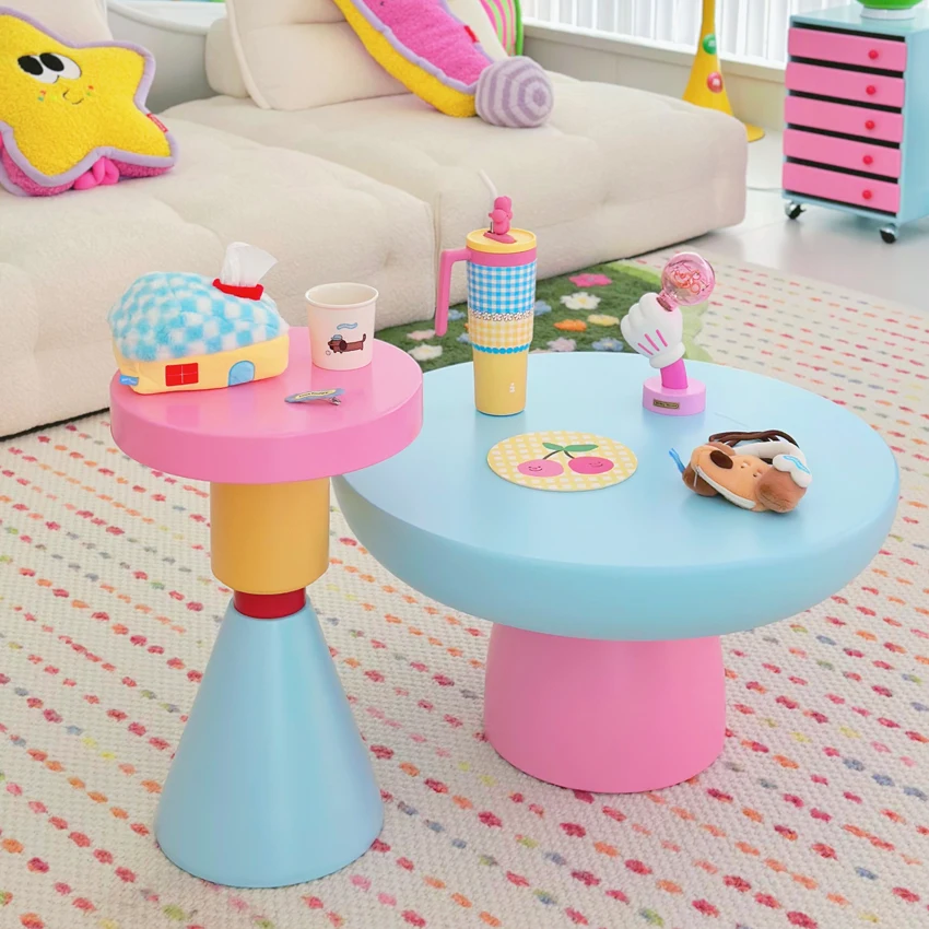 

There is a sense of home-made design, round coffee table small apartment living room