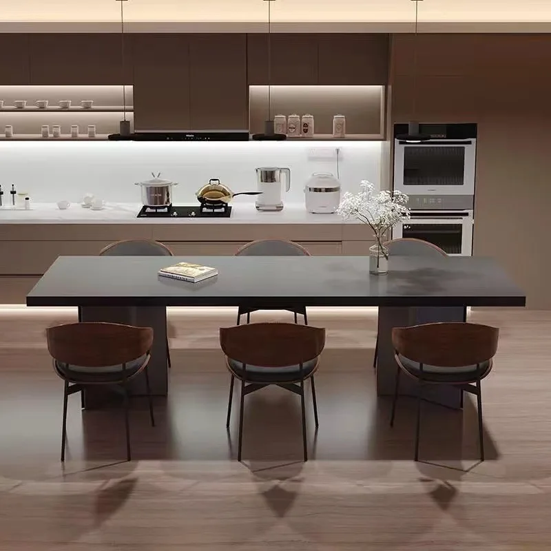 

Italian minimalist pure black thickened rock slab dining table and chair combination, large household rectangular dining table