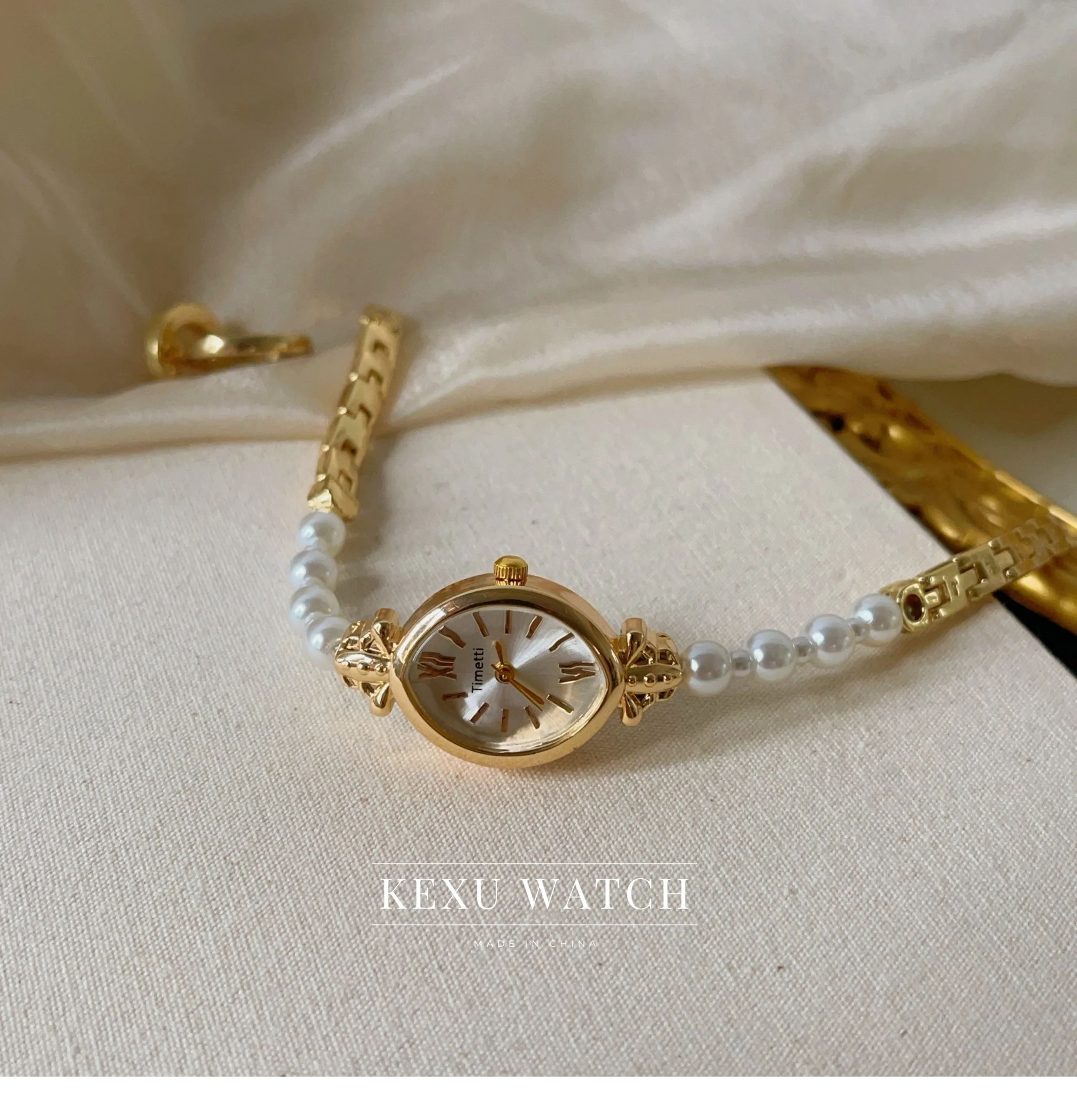 ساعة تيميتي للنساء، ساعة نسائية بسوار من اللؤلؤ مستوحاة من الطراز القديم، ساعة نسائية على الموضة ذات وجه بيضاوي للبيع بالجملة