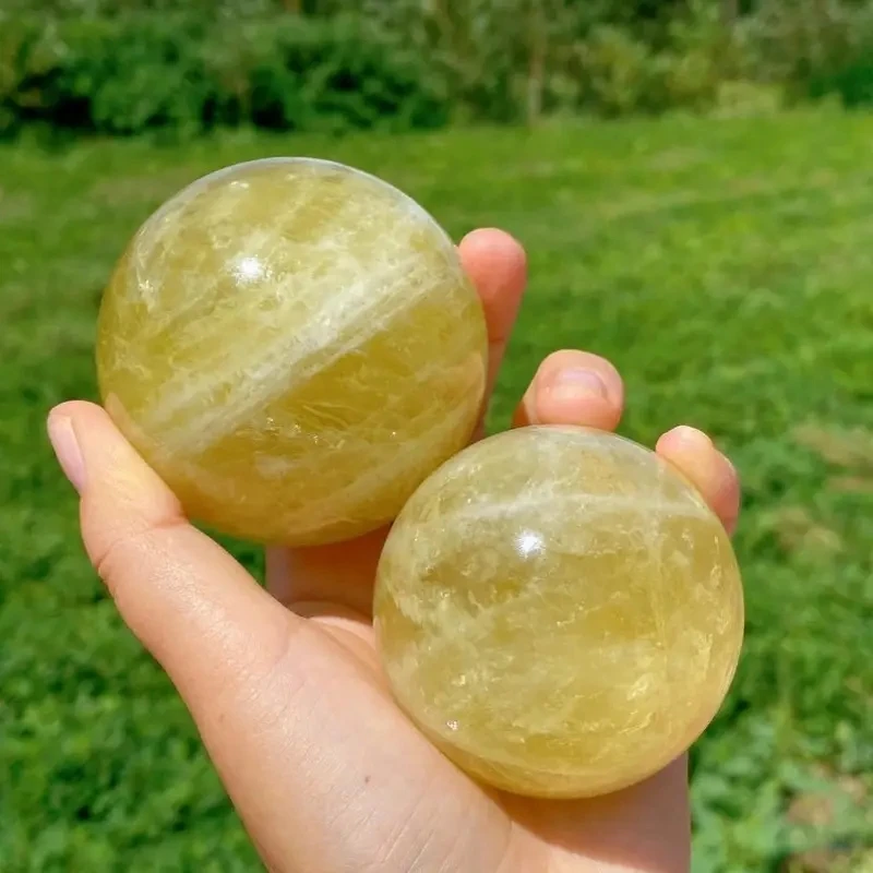 

Golden Yellow Citrine Crystal Sphere Bohemian Style Quartz Ball Perfect for Home Decoration and Unique Holiday Gifts