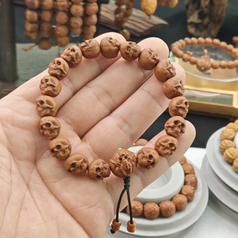 Dragon-patterned walnut carved skull bracelet, personalized for men and women, new model, genuine and purely natural, hand-held