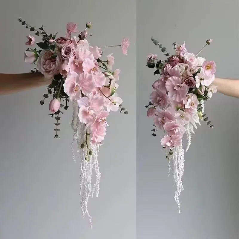 Bride wedding photography, pink butterfly orchid, silk flowers, home living room countertop dining table placement