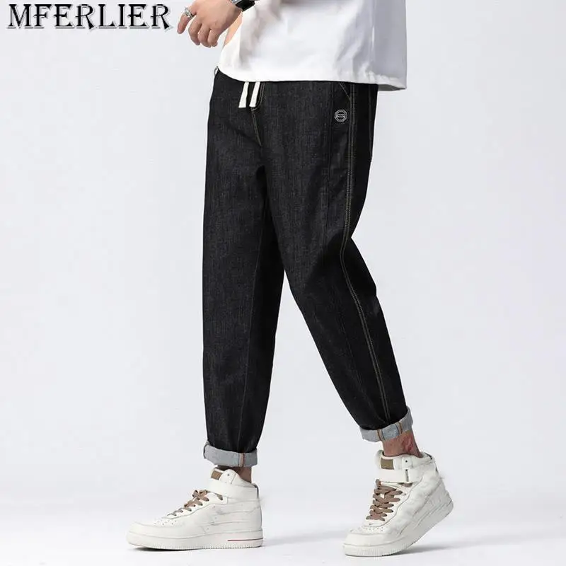 

Autumn large size jeans anti-fade straight large size men's jeans plus large elastic elastic waist Ankle-Length Pants 6XL 7XL