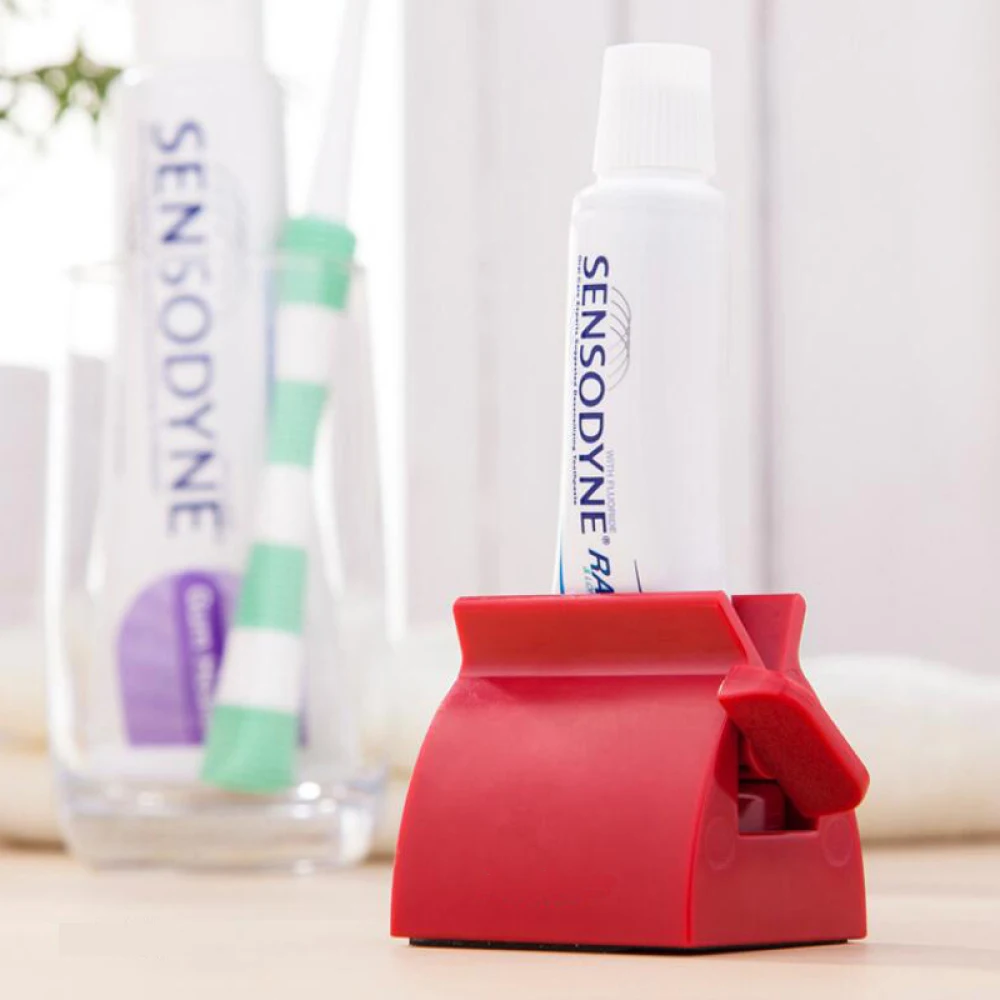 1pcs White/Red Rolling Toothpaste Tube Squeezer ABS Toothpaste Cosmetic Seat Dispenser Holder Stand Bathroom Accessories