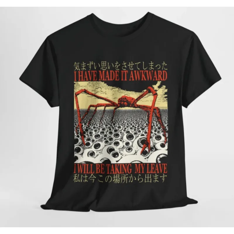 تي شيرت Cat Gallery مطبوع يدويًا على تي شيرت من القطن العضوي باللون البيج مع رسم توضيحي باللونين الأسود والأزرق لفن القطط القاضي