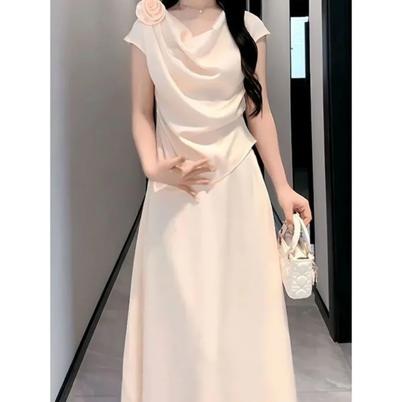 Skirt suit women's summer 2024 new high-grade sense slim irregular top temperament high waist skirt two-piece suit.