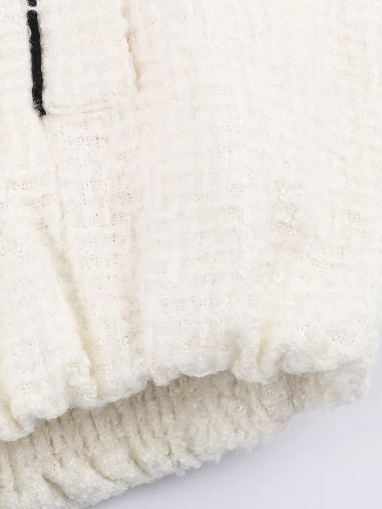 Nowy modny damski płaszcz w stylu europejskim i amerykańskim, luźny, z blokami kolorów, stójką i długimi rękawami.