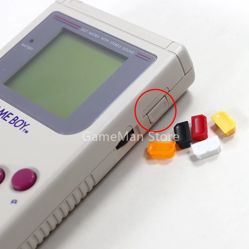 2 ชิ้นหลากสีฝุ่นสําหรับ Gameboy GB เกมคอนโซลเปลือกฝุ่นปลั๊กปุ่มพลาสติกสําหรับ GB DMG 001