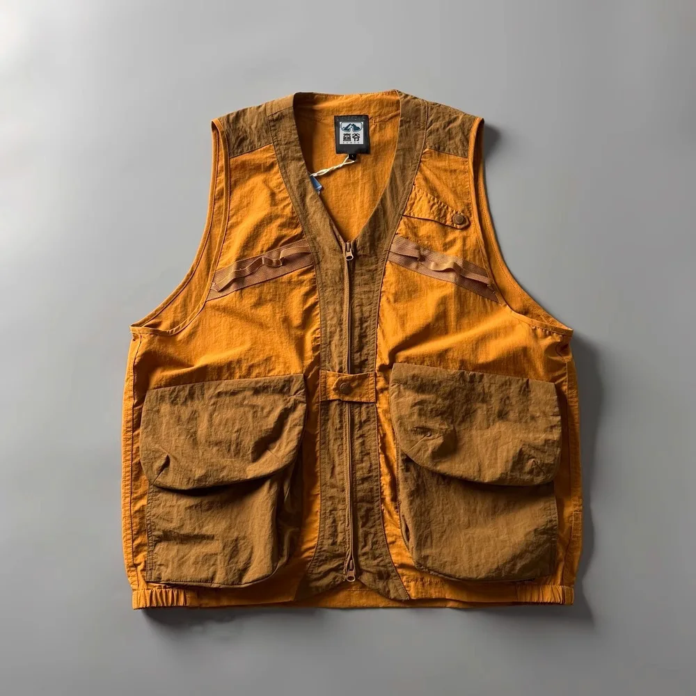 Chaleco deportivo con diseño de empalme a la moda para hombres y mujeres, chaleco holgado transpirable con múltiples bolsillos para exteriores para senderismo y pesca, novedad de 2026