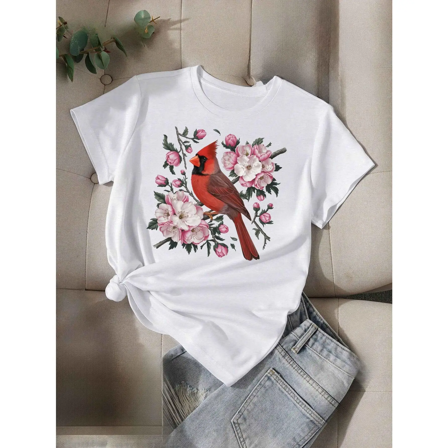 

T - shirt Embellished with Cardinal Bird Perched on Blossoming Branches, Exuding Natural Elegance