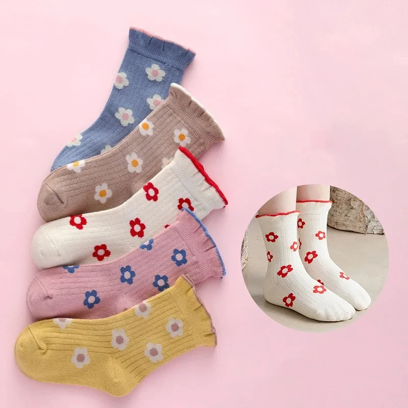 5 pairs of children\'s mid tube socks with spring and autumn love flower print for girls to keep warm. Children\'s mid tube socks