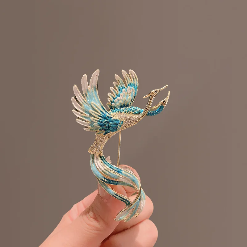 Broche phénix haut de gamme de style chinois pour femme, luxueuse et élégante avec un charme de personnalité unique.