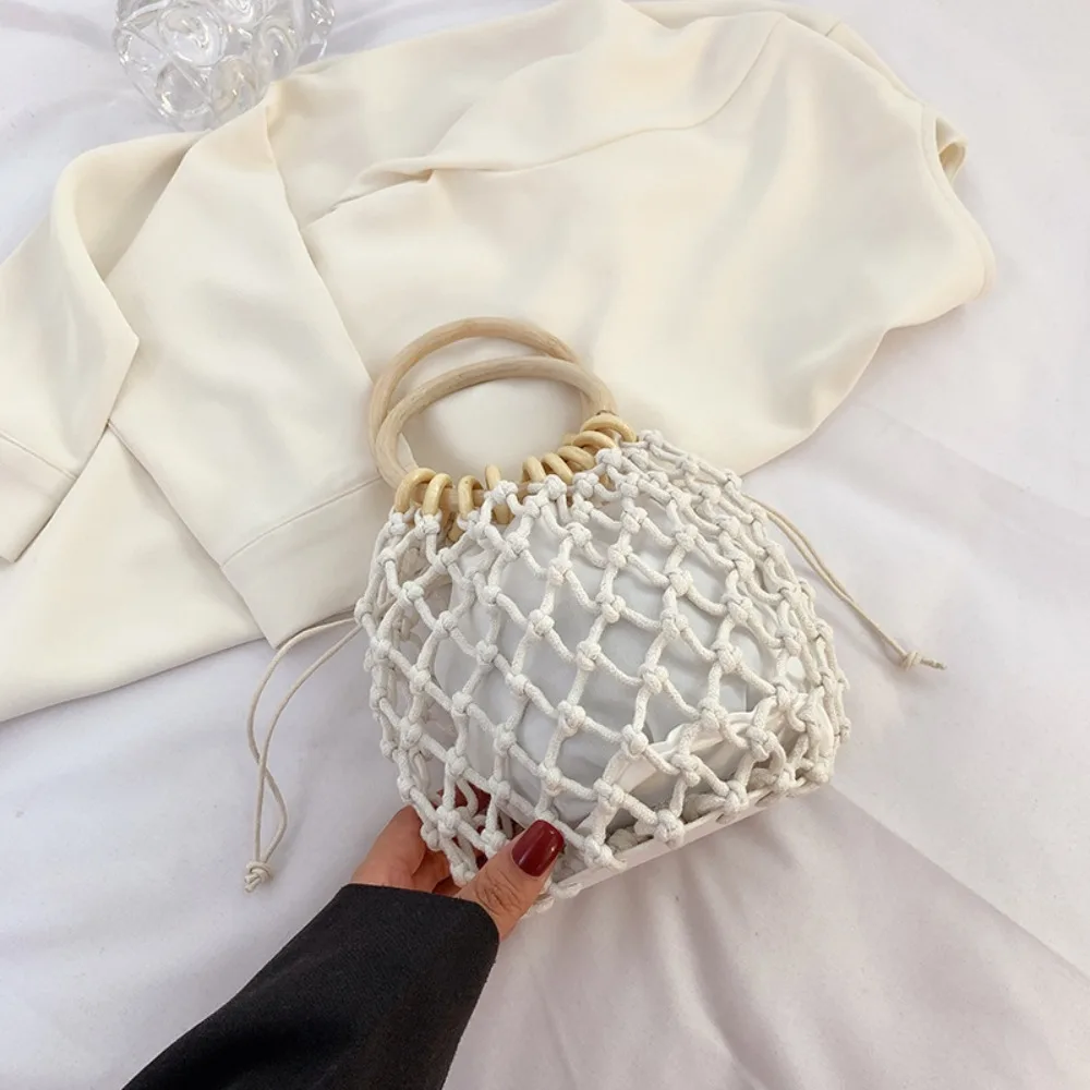 

Portable Weaving Straw Woven Handbag Elegant Handmade Woman Wrist Pack Solid Color Niche Design Bucket Tote Bag Outdoor
