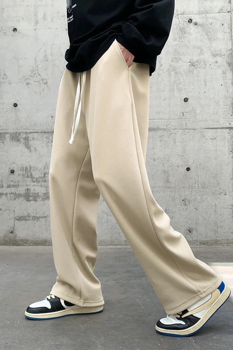 

Мужские повседневные свободные брюки на весну-осень, модные прямые спортивные брюки конусообразной формы, комфортные свободные брюки с драпировкой