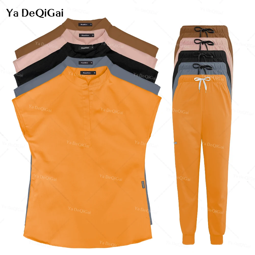 Conjunto de uniforme de Hospital para mujer, traje de Color sólido, bata quirúrgica Unisex, bolsillo, cuello en V, Joggers, precio al por mayor