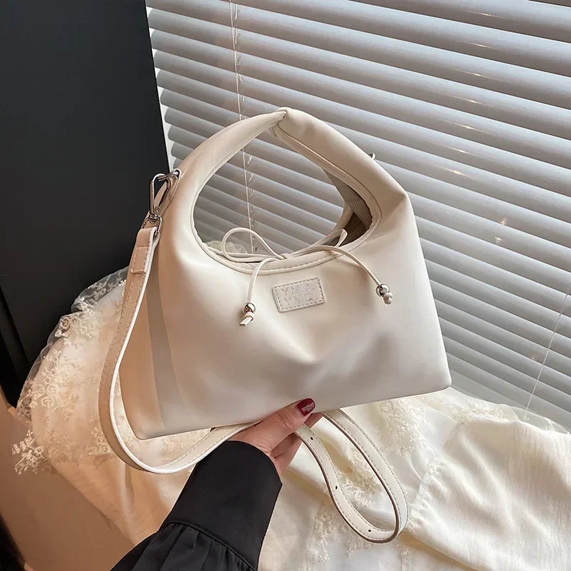 

2025 Spring - Summer New! Women's Eye - Catching Dumpling - Shaped Crossbody Bag with Fashionable Hand - Held Design