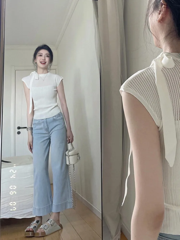 

Весенний женский облегающий трикотажный топ с коротким рукавом, завязками на плечах и вставками из пэчворка, создающий ощущение роскоши